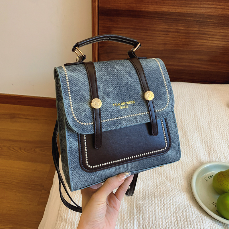 Alta sensación de vaquero pequeño una bolsa de tres mochilas para mujeres 2024 nueva moda mochila de viaje corto