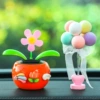 Grapefruit red+three small flowers+balloons