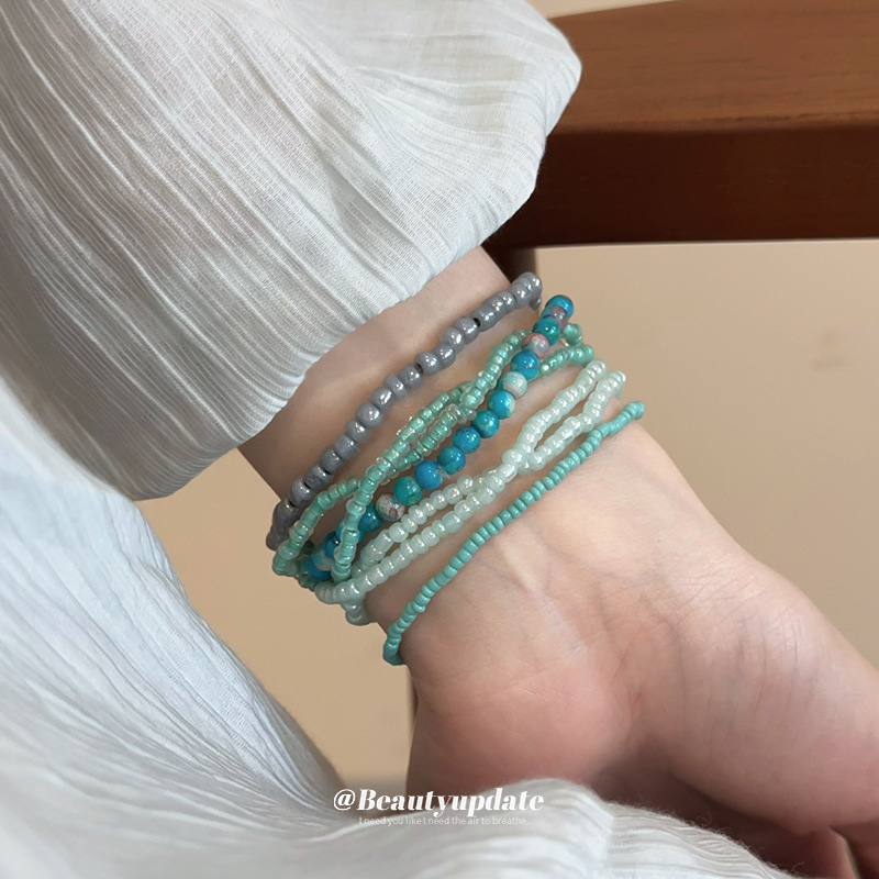 Pulsera de cuentas de arroz apilada de estilo bohemio, juego de siete piezas, pulsera de dopamina de alta calidad, joyería fresca de nicho al por mayor
