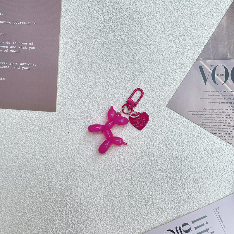 Pequeño Libro Rojo mismo lindo jalea globo láser perro llavero colgante colorido cachorro de dibujos animados teléfono llavero