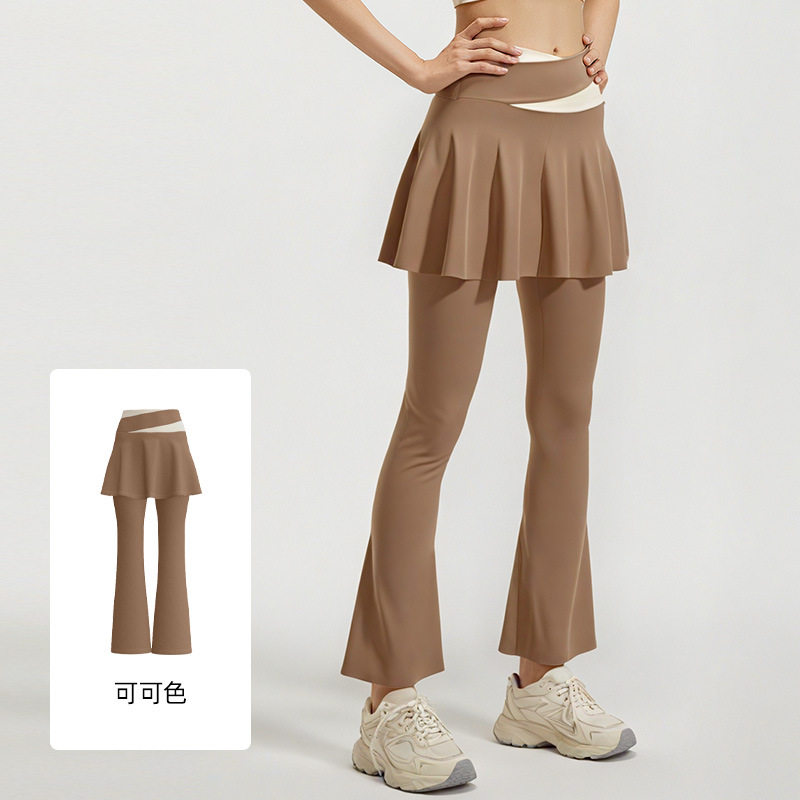 Los nuevos pantalones de falda de cuerno a juego de color de Juyitang son elásticos y delgados, falsos dos pantalones de yoga para correr de cintura alta