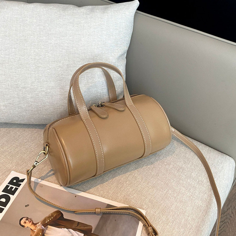 植なめしの上の牛革の枕の包みの女性の高級感の百合の小さい大衆のハンドバッグの女子学生のファッションのボストンバッグの女性