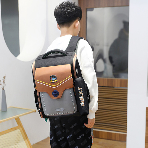 Natural Fish New English Style 1st to 6th Grade Orthopedic and Back Pain Relieving Double Shoulder Backpack for Boys and Girls