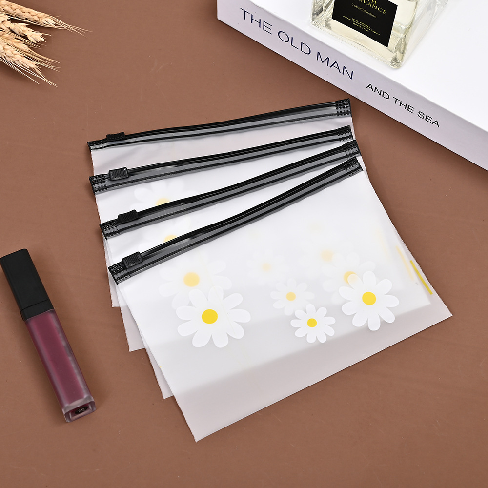 Bolsa de cremallera Margarita bolsa de anillo de pelo estilo coreano bolsa de cremallera fresca translúcido dedo esmerilado bolsa de almacenamiento al por mayor