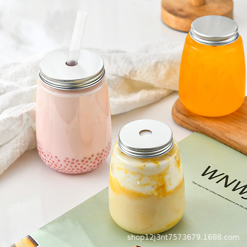 En stock Botella de plástico en forma de U Botella de bebida de jugo de mascota transparente 500ml Botella de té de leche desechable de grado alimenticio al por mayor