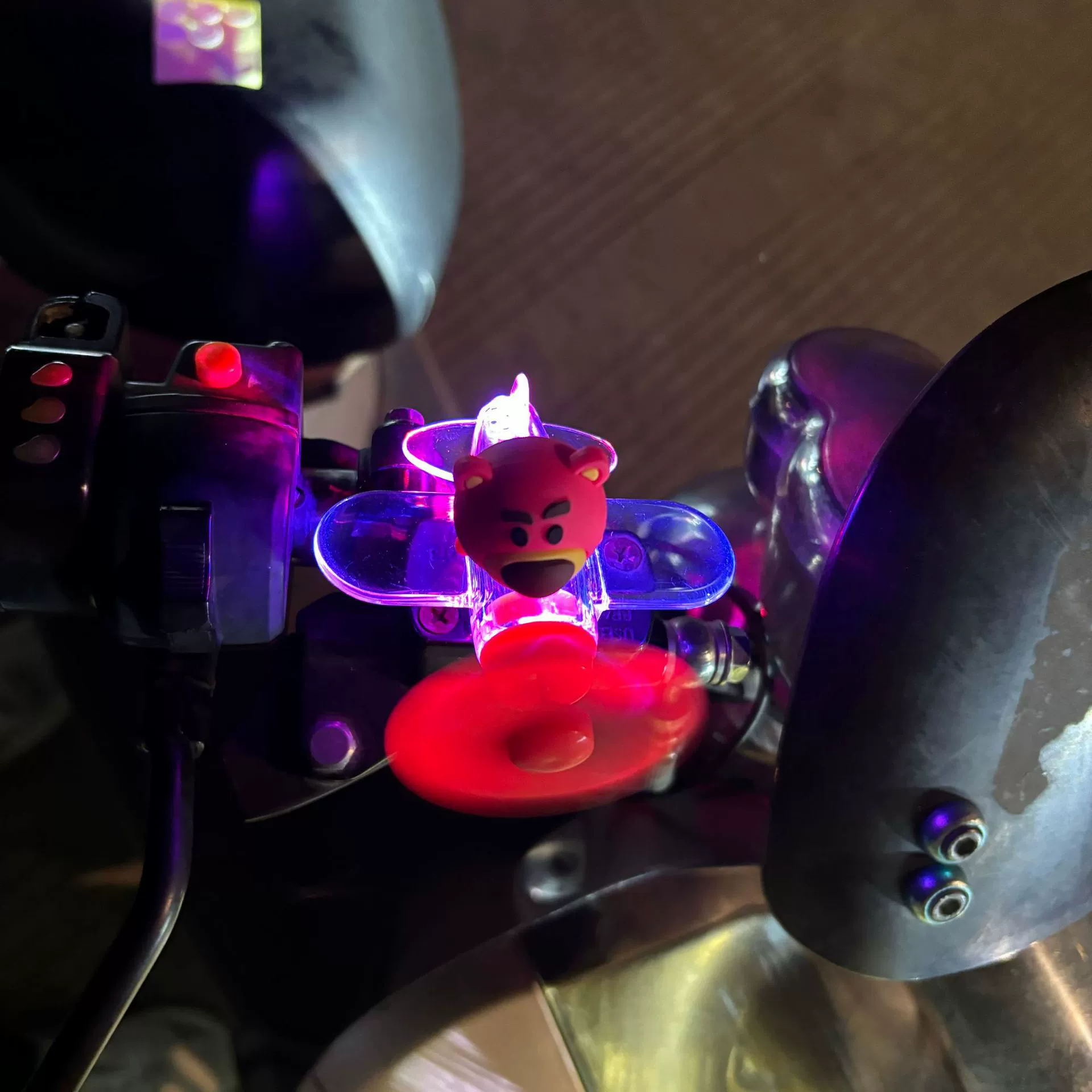 Electric car, glowing airplane, rotating decorations, generating electricity