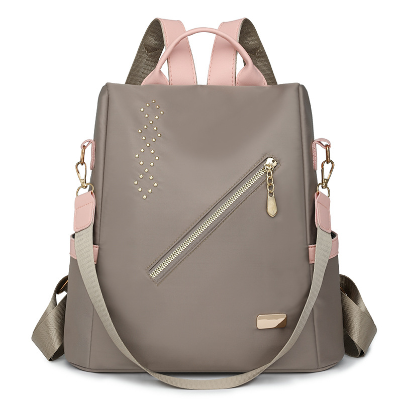 Nuevo estilo remache damas mochila antirrobo moda ligero ocio viajes al aire libre mochila de nailon mochila escolar para estudiantes