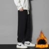 Black fleece trousers, loose straight fit