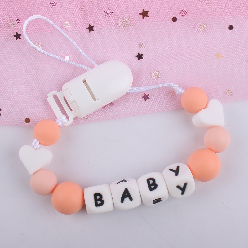 Bebé suministros de dibujos animados de silicona amor creativo bebé DIY colorido carta de silicona chupete cadena anti-gota cadena