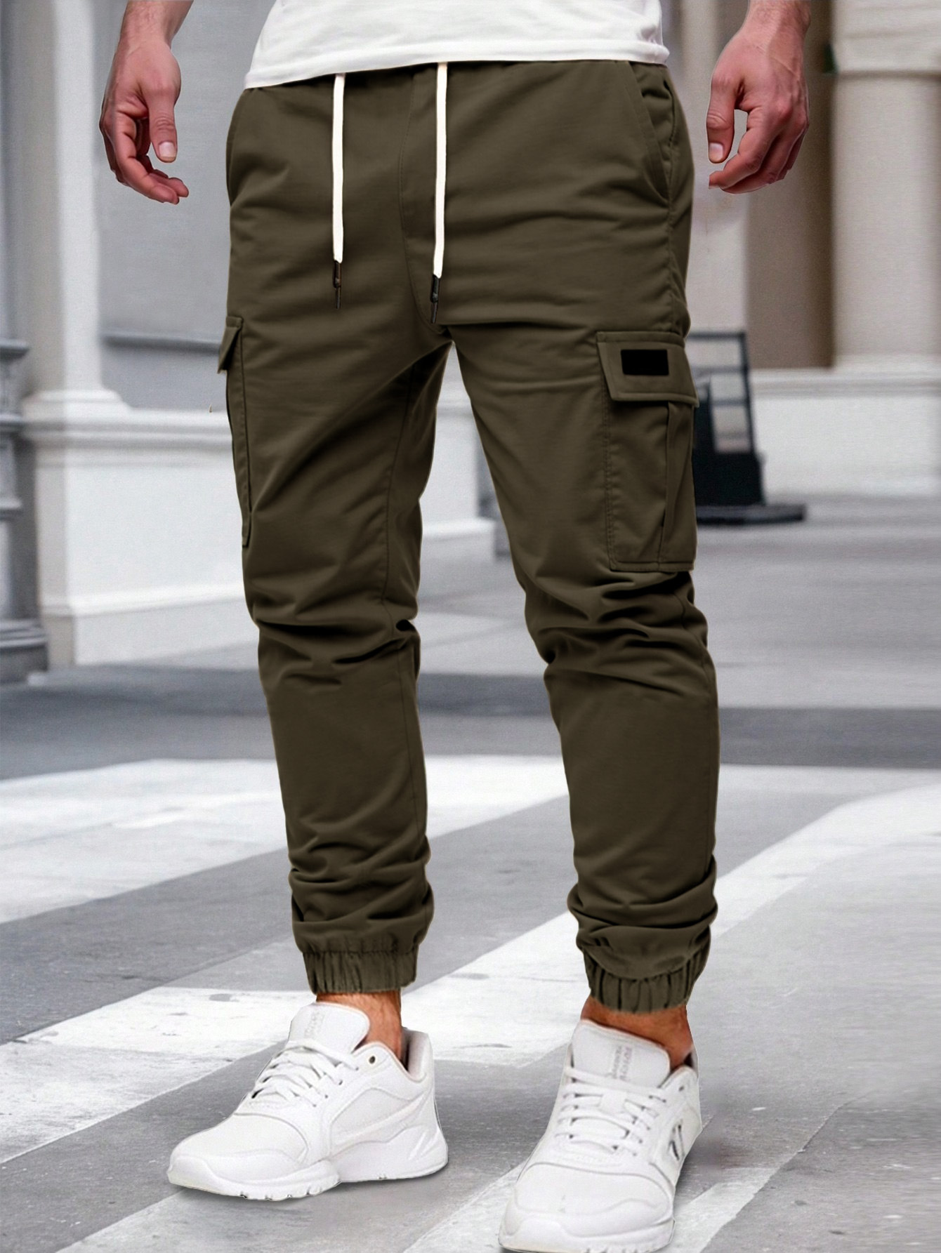 Nuevos pantalones de estilo europeo transfronterizo de hombre de bolsillo multi-bolsillo, pantalones de estilo de moda de comercio exterior.