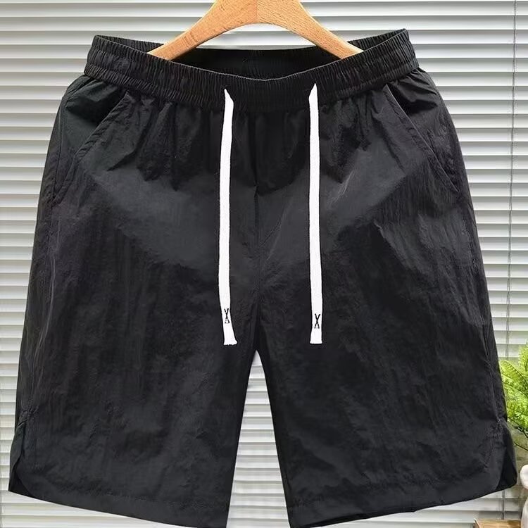 Nuevos pantalones de tendencia de cinco puntos para hombres comercio exterior transfronterizo de verano pantalones de playa para hombres pantalones cortos deportivos de cinco puntos para hombres pantalones de tendencia