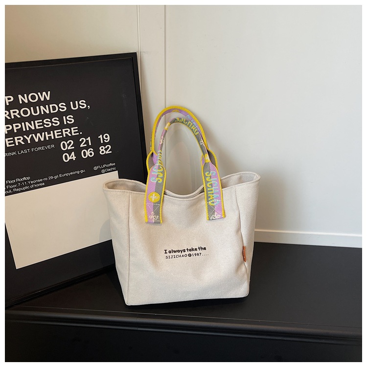 Bolso de lona de gran capacidad para mujeres 2026 verano nuevo bolso de mano ligero y simple para viajar bolso de ocio bolso de mamá