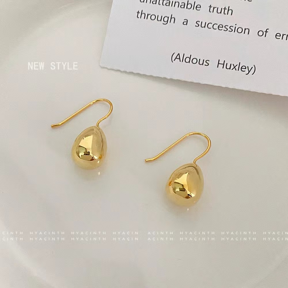 Cuelga de orejas especial, estilo de moda, gancho de orejas fría, feng shui, bronce chapado en oro, oro simple y brillante