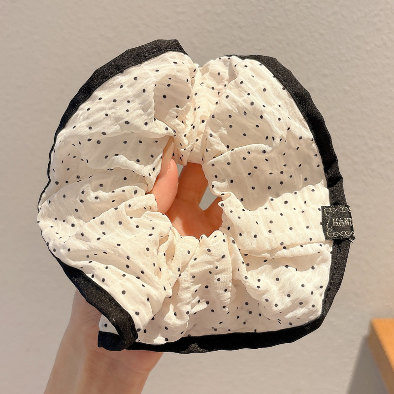 1 # Círculo de puntos finos de borde negro-blanco de unos 17cm