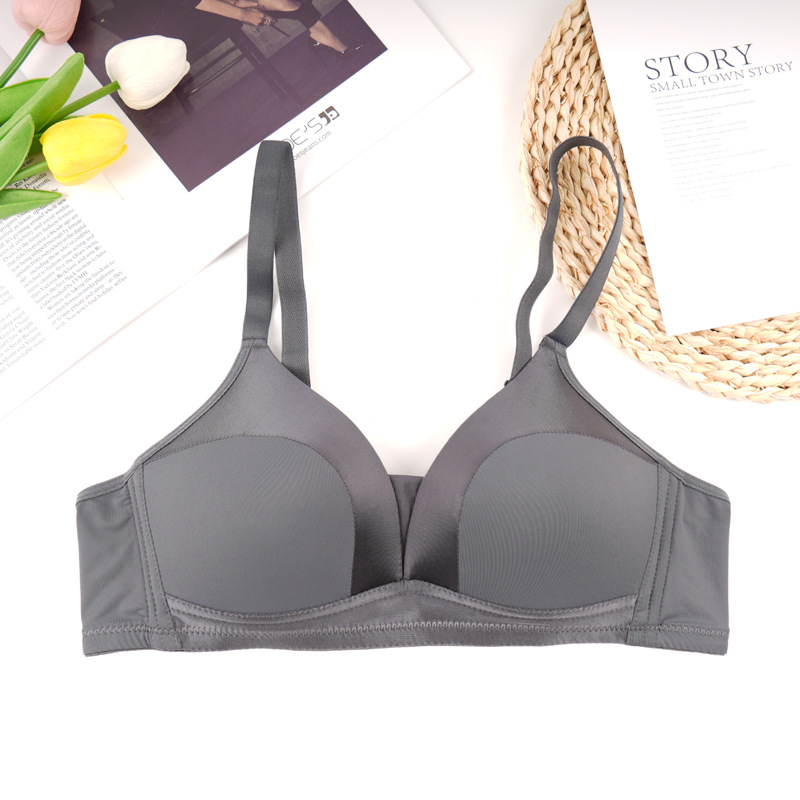Fábrica de Shantou punto sin anillo de acero sujetador de mujer una pieza de ajuste cómodo sin marcas juntar sujetador de ropa interior anti-caída