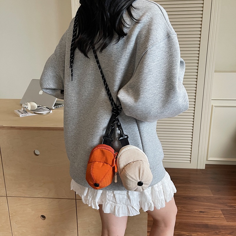 Mini crossbody coin purse, baseball cap, trendy earphone organizer, keychain, coin pouch, 2026 new style.