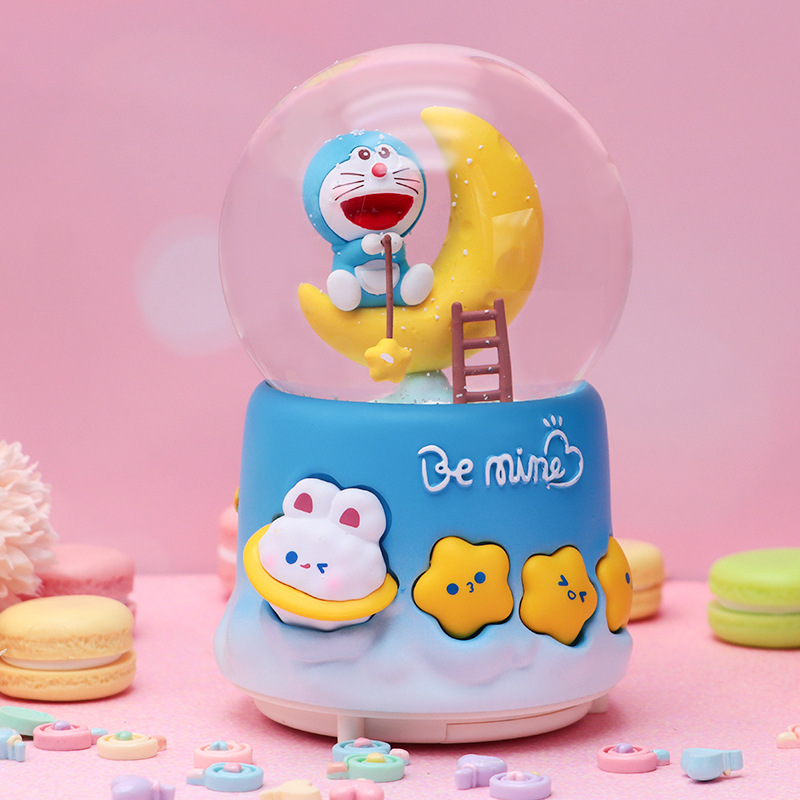 Linda campana tren azul gordo bola de cristal caja de música para niños y compañeros de clase regalo caja de música de nieve brillante