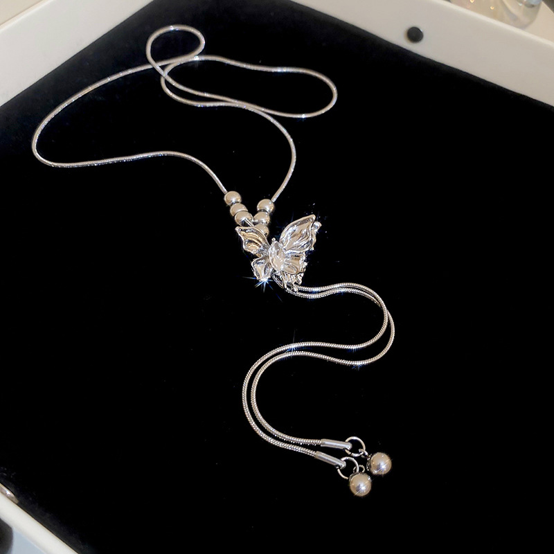 Serie de plata Collar de borla de cuentas de mariposa ajustable Cadena de clavícula de moda exquisita Cadena de suéter de diseño de lujo ligero Mujer