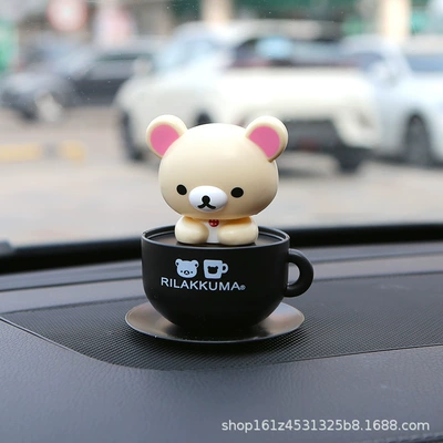 car dashboard shaking head – Car ornaments - 101011-solar-powered-nodding-ornament-beige-coffee-cup-bear