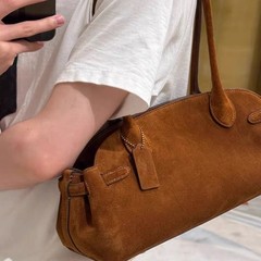 2025新款麂皮通勤单肩腋下法棍包小众轻奢高级感手提保龄球包女包