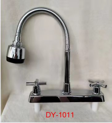 En stock transfronteriza de América del Sur grifo de agua caliente y fría pieza de cerámica doble interfaz de plástico grifo de la cocina a prueba de salpicaduras