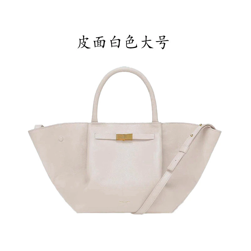 Handheld capacious purse, shoulder bag
