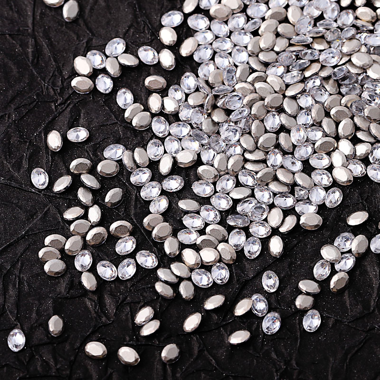 Mini beveled zircon, white, 3x4mm oval