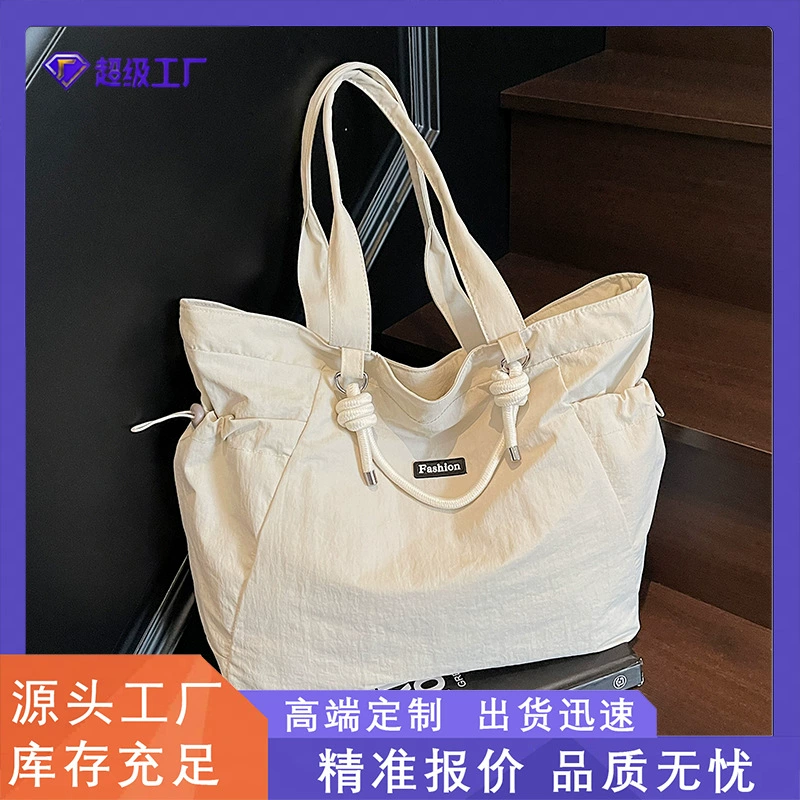 Женская сумка-тоут, новинка лета 2025, большая вместительная легкая сумка для путешествий, модная повседневная простая нейлоновая сумка на плечо