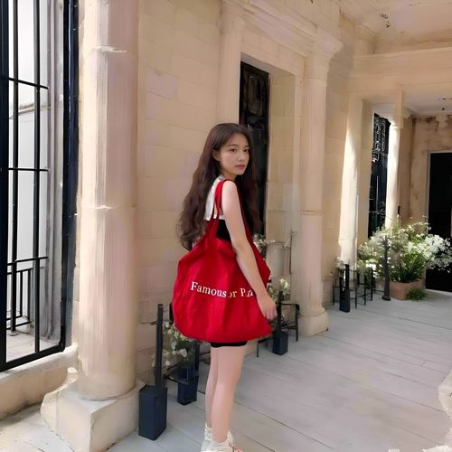 A stylish and high-end red letter single-shoulder crossbody tote bag with a large capacity, suitable for casual and commuting, featuring a Korean aesthetic.