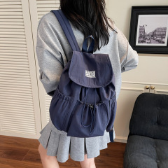 女子高校生用リュックサック、2025年冬新作、おしゃれなレタープリントバックパック、シンプルで大容量のトラベルバッグ