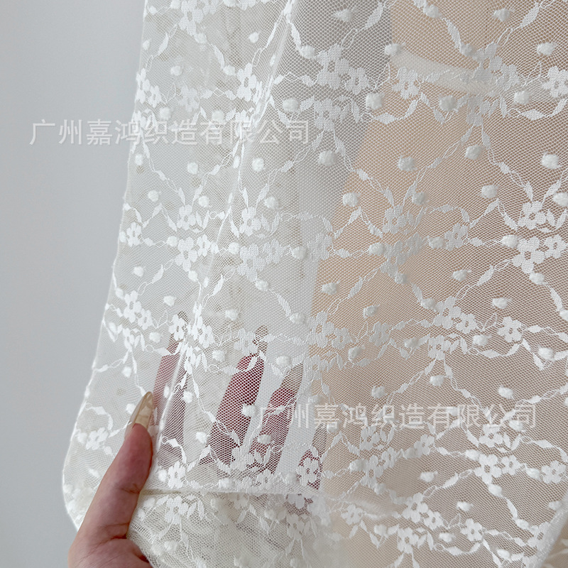 Tejido de encaje elástico jacquard tridimensional para hacer falda, vestido de perspectiva, falda elástica, albaricoque blanco y negro en stock
