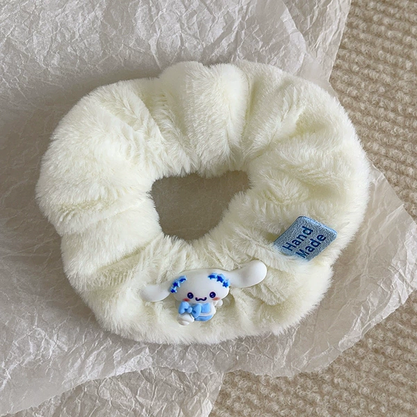 Plush white butterfly dog