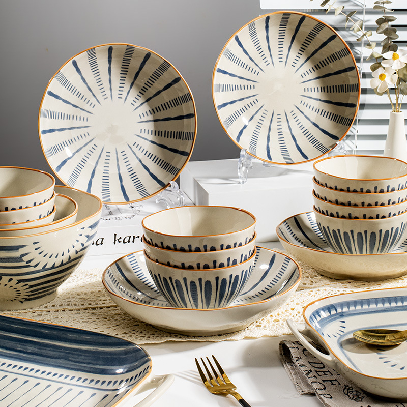 Tacos de arroz de color esmaltados japoneses domésticos 2025 nuevos platos de cerámica de alto valor de superficie platos de platos de alta calidad