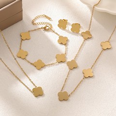 新型日韓光沢チタン鋼金色四葉草ネックレスブレスレットピアスセット18k色あせない女性