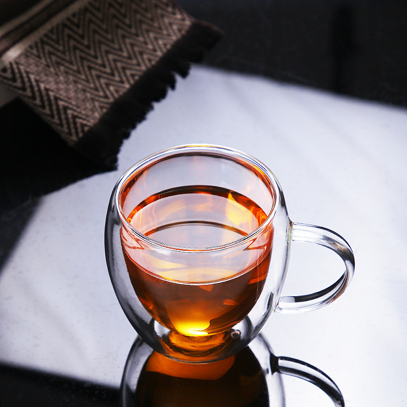 Vaso de vidrio de doble capa de borosilicato para el hogar con asa Taza de café con forma de huevo de ganso minimalista moderno