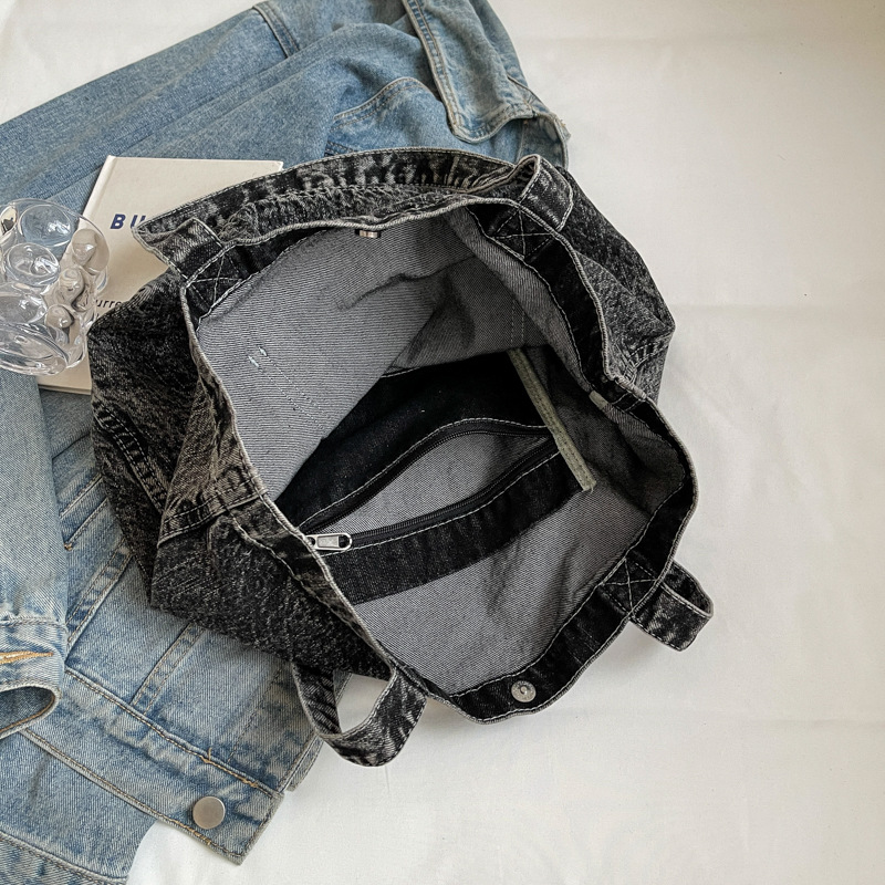 2024 verano nuevo estilo mezclilla bolso de hombro de cercanías simple retro de gran capacidad bolso de mujer al por mayor de moda