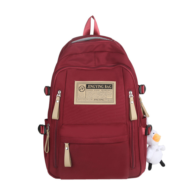 Nueva mochila escolar de estudiantes de secundaria y secundaria de nylon de moda universal mochila casual para hombres y mujeres para viajar mochila de computadora