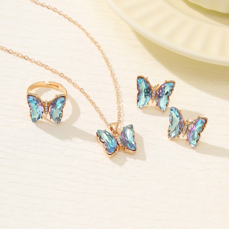 Ventas transfronterizas calientes coloridas 3 piezas de aretes collar anillo de moda europea y americana mariposa elegante collar de diamantes para mujeres