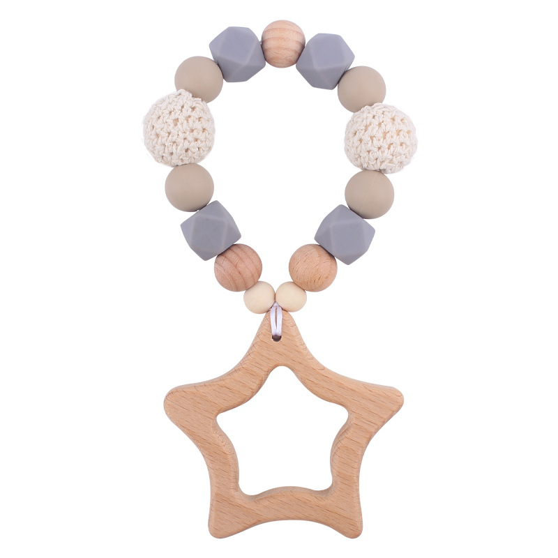 Nuevo bebé de dibujos animados Beech Star teether DIY calmante bebé mordedura de pegamento molar pulsera juguete