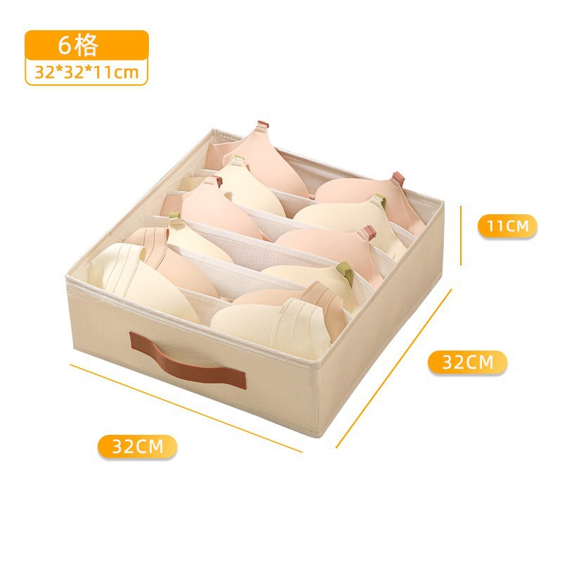 Caja de almacenamiento beige con 6 compartimentos.