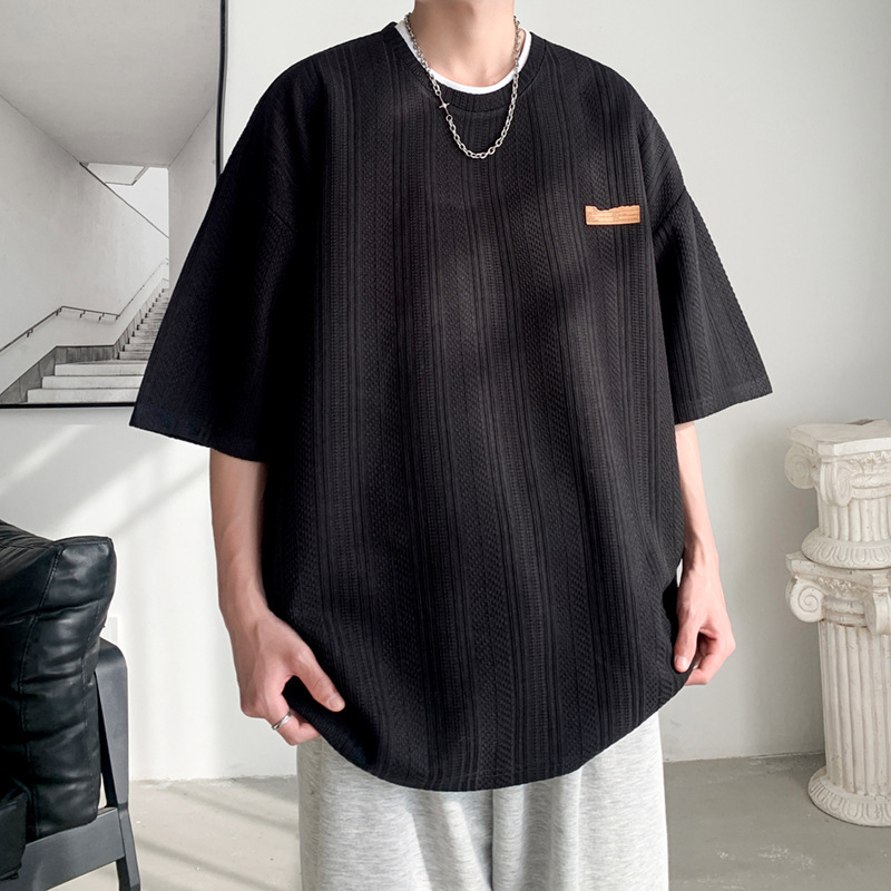 Camiseta de manga corta de verano de Hong Kong Tide para hombres inins coreanos sueltos versátiles Jacquard camiseta de cuello redondo de marca de marea chaqueta transpirable