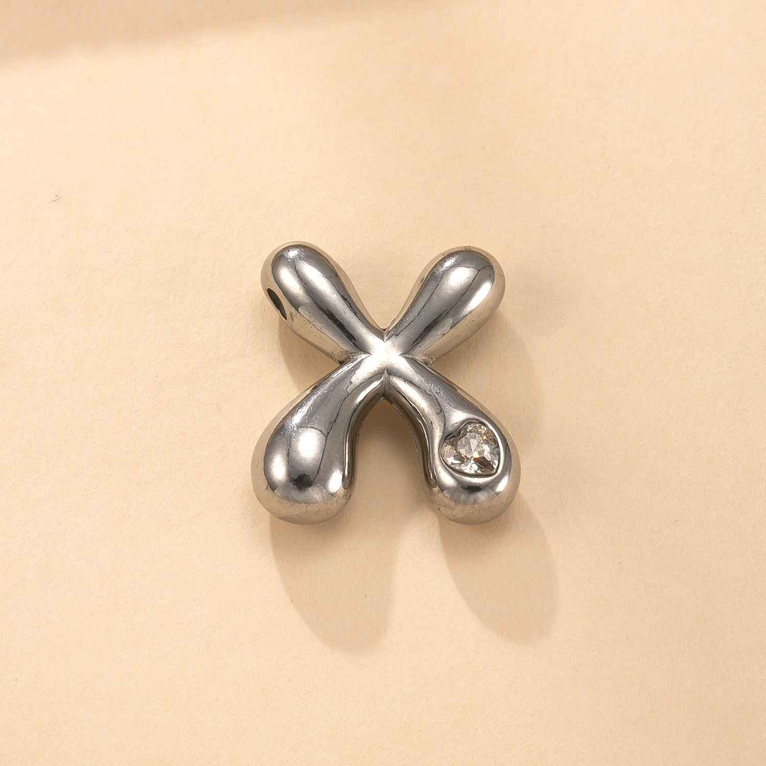 Colgante único transfronterizo de joyería de acero inoxidable fundición con incrustaciones de diamantes de color 26 letras accesorios de collar moda simple pulsera briy