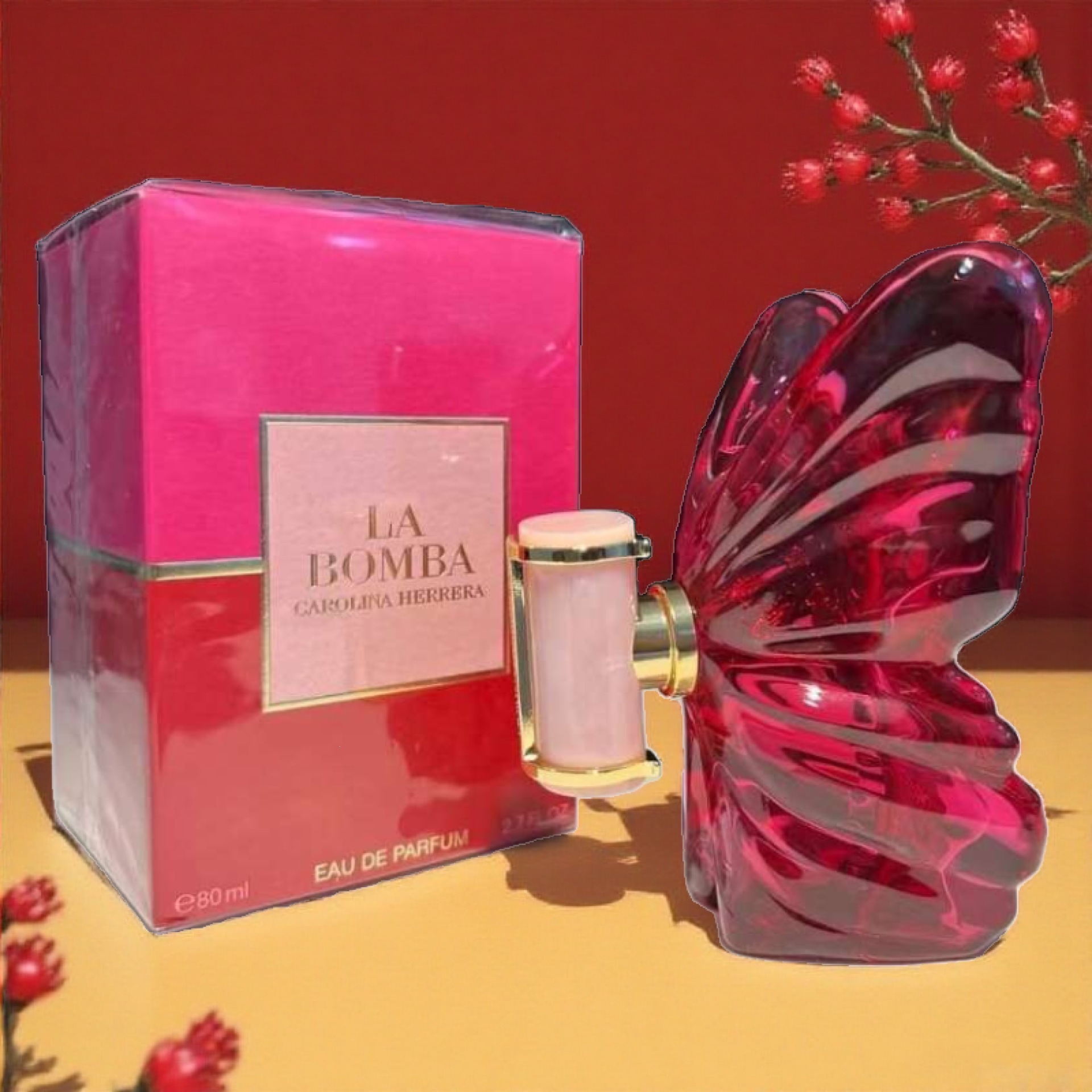 Red elegant gift box with bow, perfume