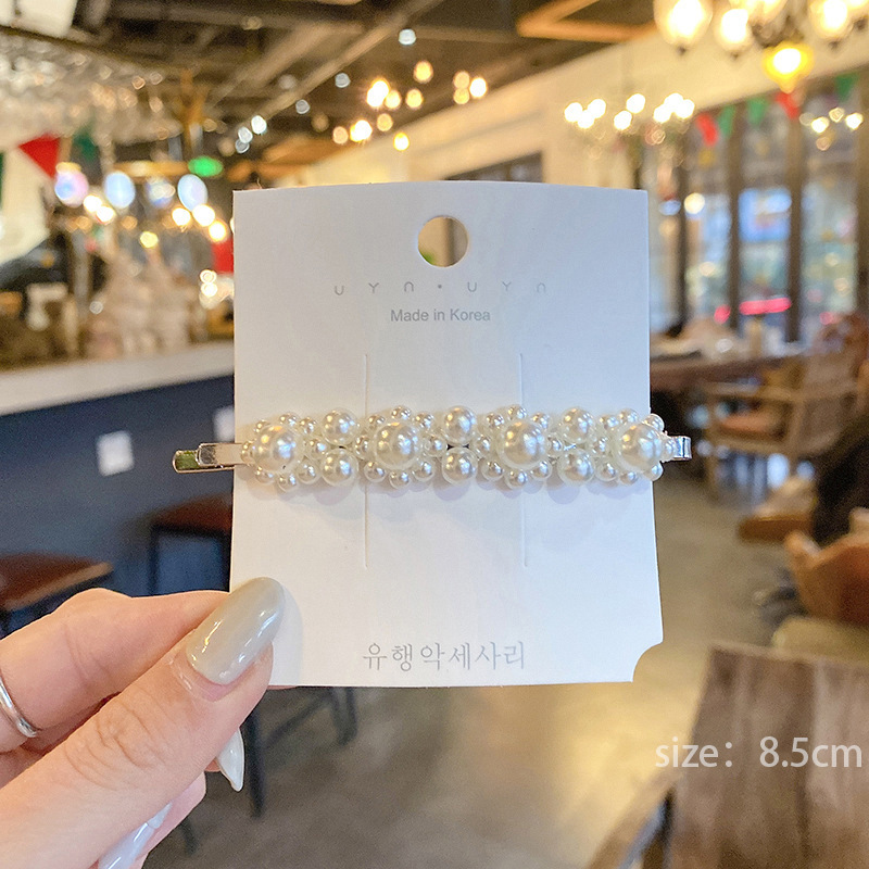 Pasador de pelo de perlas de alta gama estilo francés para mujer, clip para flequillo lateral, elegante clip para el pelo de la frente, accesorio para el pelo tipo pico de pato.