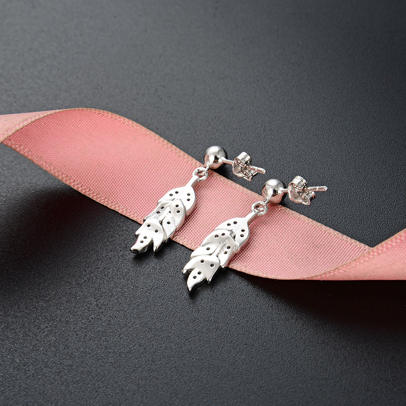 Comercio exterior nuevo estilo japonés y coreano s925 pendientes de diamantes de plata pequeña joyería popular fresca pendientes de plumas personalizadas