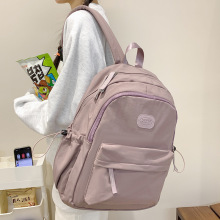 跨境轻便小众双肩包女初中高中大学生书包女日系纯色简约通勤背包