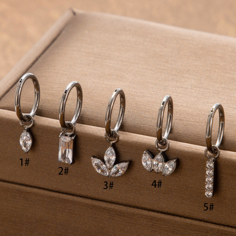 Henson nuevo europeo y americano nuevo popular G23 pendientes de titanio pendientes de circón pendientes de moda todo partido pendientes de perforación