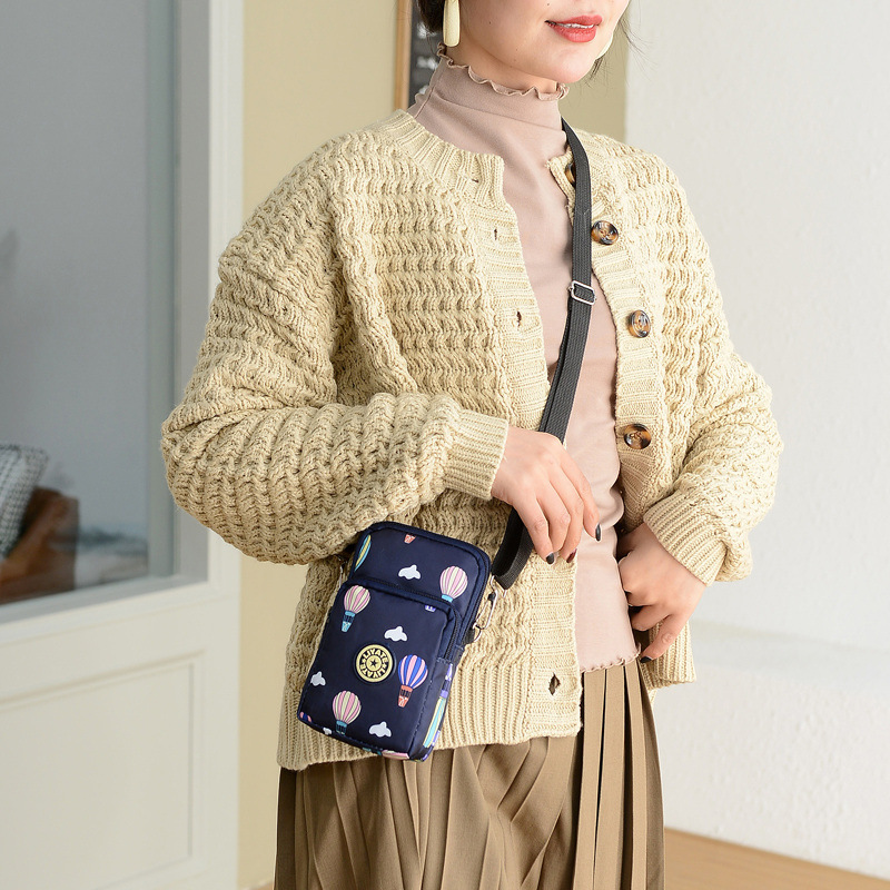 Bolsa de puesto 2021 nueva bolsa de teléfono móvil crossbody bolso de mujer halter teléfono móvil cambio vertical bolsa de brazo corriente