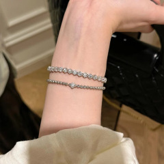 Xiaohongshu 人気のフラッシュ六角形ハニカムブレスレット女性のライト高級ニッチ絶妙なファッションブレスレットドロップシッピング