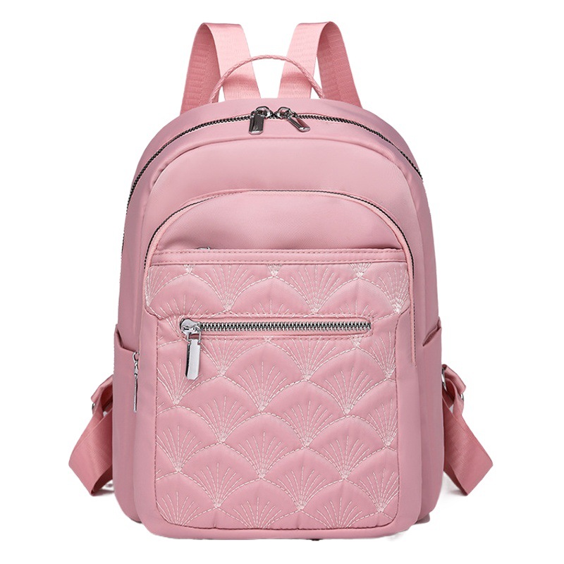 2024 nueva mochila de nylon bordada casual para mujer simple y ligera mochila de viaje de viaje urbano mochila escolar de moda
